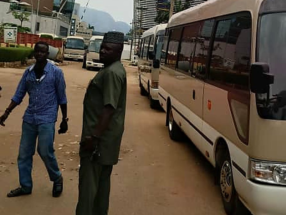 Toyota Coaster staff bus on station in central Abuja