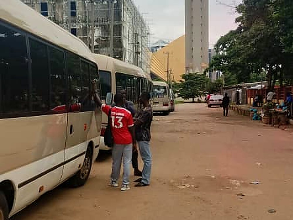 Staff boarding a Coaster bus on a scheduled route