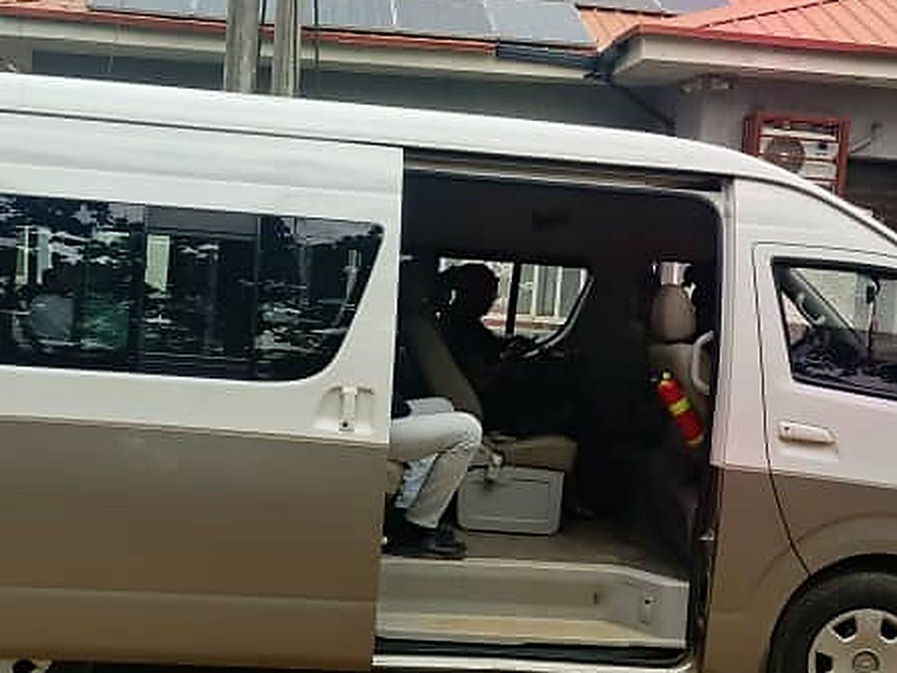 Toyota Hiace crew van with the side door open